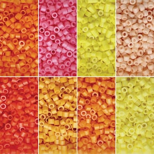May include: A collection of small, cylindrical plastic beads arranged in eight distinct vertical panels. The colors include shades of orange, pink, bright yellow, peach, red, golden yellow, and light yellow, all featuring a central hole.
