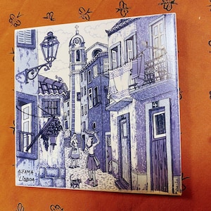 Portuguese blue and white tile with Alfama scene and crok backing