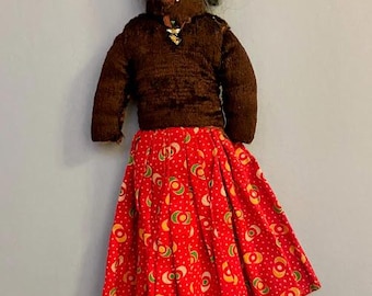 Vintage Navajo cloth doll with braided wool hair and traditional clothing