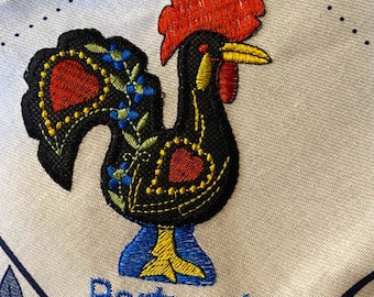Cotton Portuguese tea towel printed with traditional blue & white azulejos edge patterns and embroidered rooster