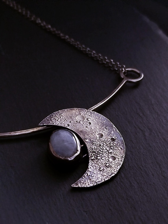 Lunar Talisman – Sterling Silver Crescent Moon with Suspended Moonstone Cabochon