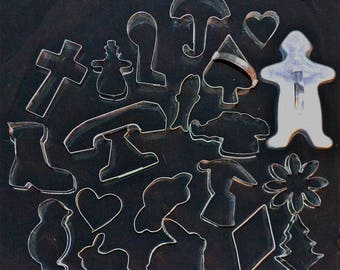 20 tin cookie cutters in various shapes