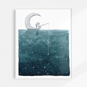 May include: A watercolor illustration of an astronaut fishing from a crescent moon in a dark blue sky filled with white stars.
