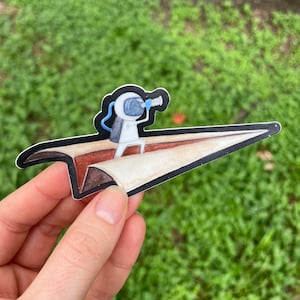 Astronaut Vinyl Sticker | Astronaut on paper airplane watercolor vinyl sticker