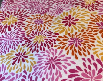 flowers   In PInk, orange and yellow on a white background fitted  crib/toddler  sheet