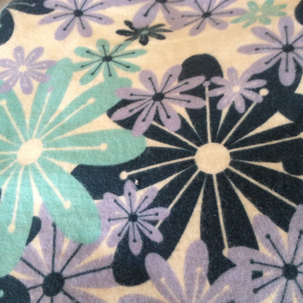 A flower print in aqua and navy fitted crib /toddler sheet