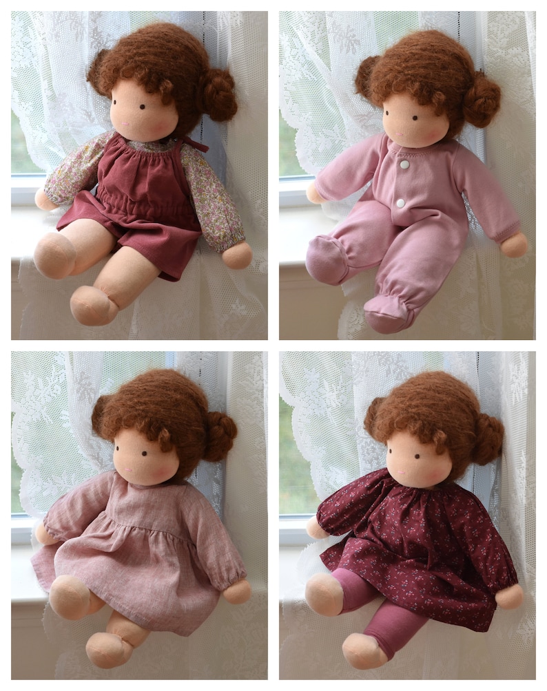 May include: Four handmade cloth dolls with brown hair and different outfits. The dolls are sitting on a windowsill with white lace curtains.