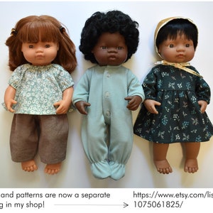 May include: Three dolls wearing different outfits. The doll on the left is wearing a light green floral top and brown pants. The doll in the middle is wearing a light blue onesie. The doll on the right is wearing a dark green floral dress.  Miniland patterns are now a separate listing in my shop! https://www.etsy.com/listing/1075061825/