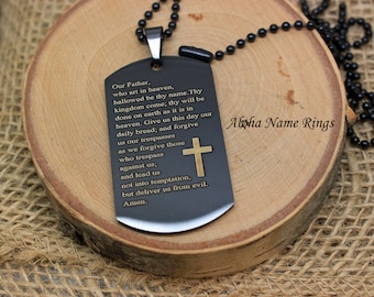 Lord's Prayer With Cross Black Stainless Steel Military Style Dog Tag. Laser Engraving on Back is Optional. Includes USA Made Ball Chain.