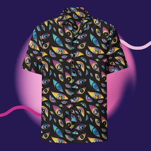 May include: Black button-down shirt with a vibrant all-over eye pattern in shades of yellow, blue, purple, and green. The short-sleeved shirt features a classic collar and button closure, perfect for a bold statement.