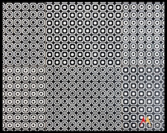 May include: A close-up of a collection of black and white tiles arranged in a grid pattern. Each tile features a repeating geometric design of octagons and circles, creating a visually striking and symmetrical pattern. The tiles are likely for flooring or wall decor.