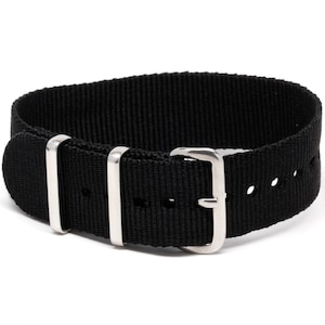 May include: A black nylon watch strap with silver buckle and keeper loops.