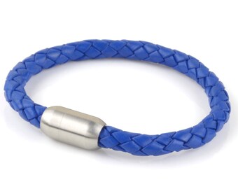 May include: A blue leather bracelet with a silver magnetic clasp.
