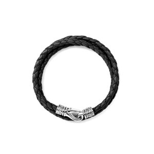 May include: A black leather bracelet with a braided design and a silver clasp.