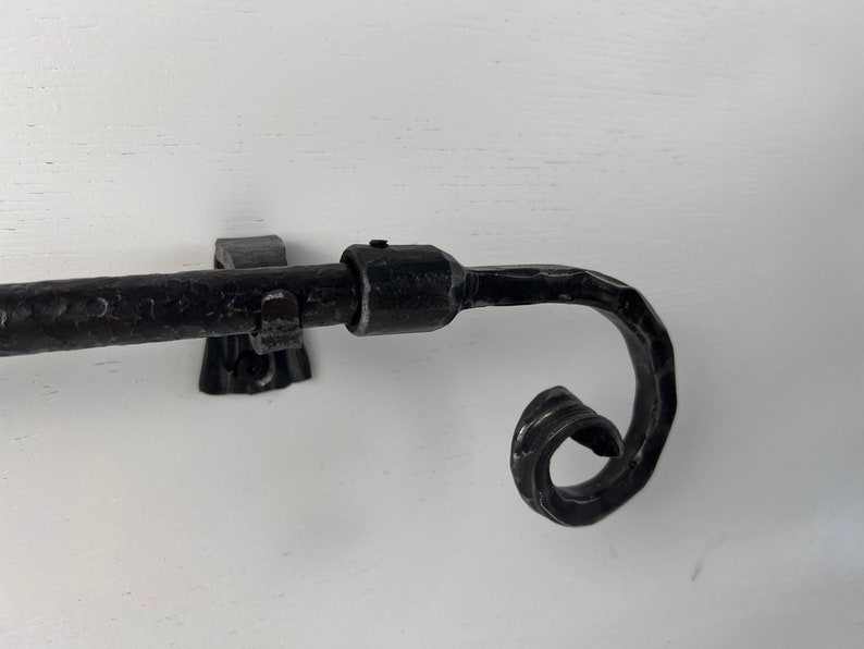 Curtain rod wrought iron with scroll end hand forge