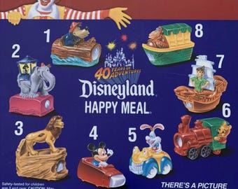 Juguete de Cajita Feliz para el 40.º aniversario de Disneyland, nuevo en paquete, juguete raro de McDonald's, serie completa de los años 90 de 1995, elige uno, parque temático de juguetes con ruedas