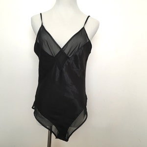vtg sexy black onepiece with mesh trimming