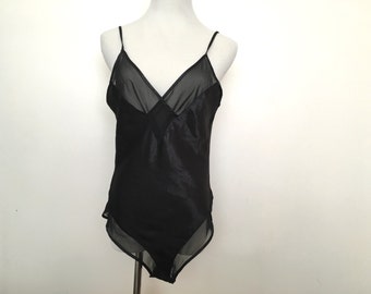 vtg sexy black onepiece with mesh trimming