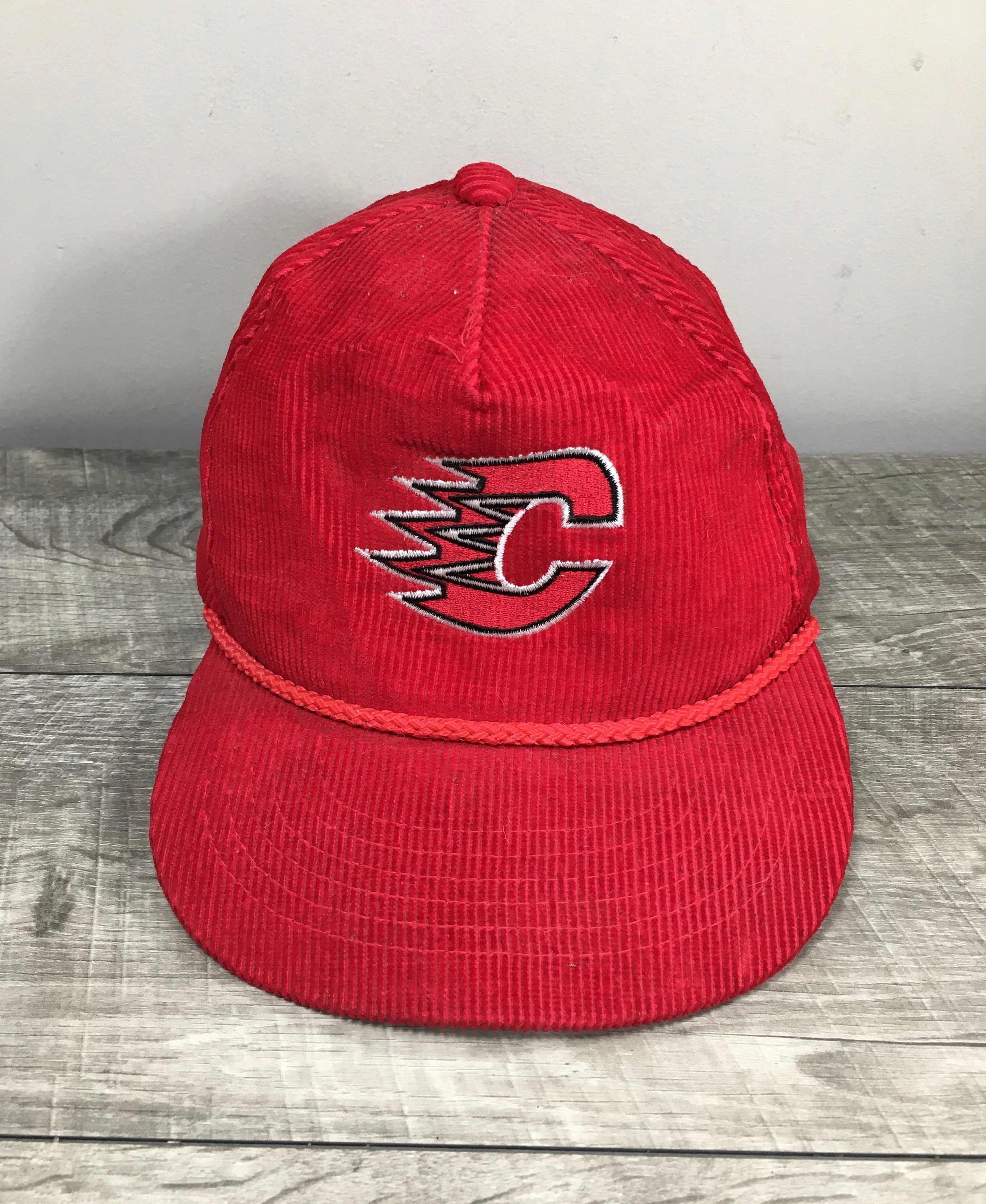 Percy's Vintage & Collectables - 🔥CALGARY FLAMES🔥 The symmetry of this  vintage Calgary Flames jersey are absolutely nuts! It's got a huge  embroidered Flames logo on the front too. This and a