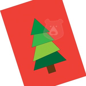 May include: A red card with a green Christmas tree made of triangles. The tree has a brown trunk.