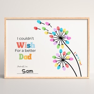 May include: A framed print with the text "I couldn't Wish For a better Dad" in colorful letters. The artwork features dandelion-like designs with colorful finger-painted accents and the words "I love you!" and "Made with Love, Sam".