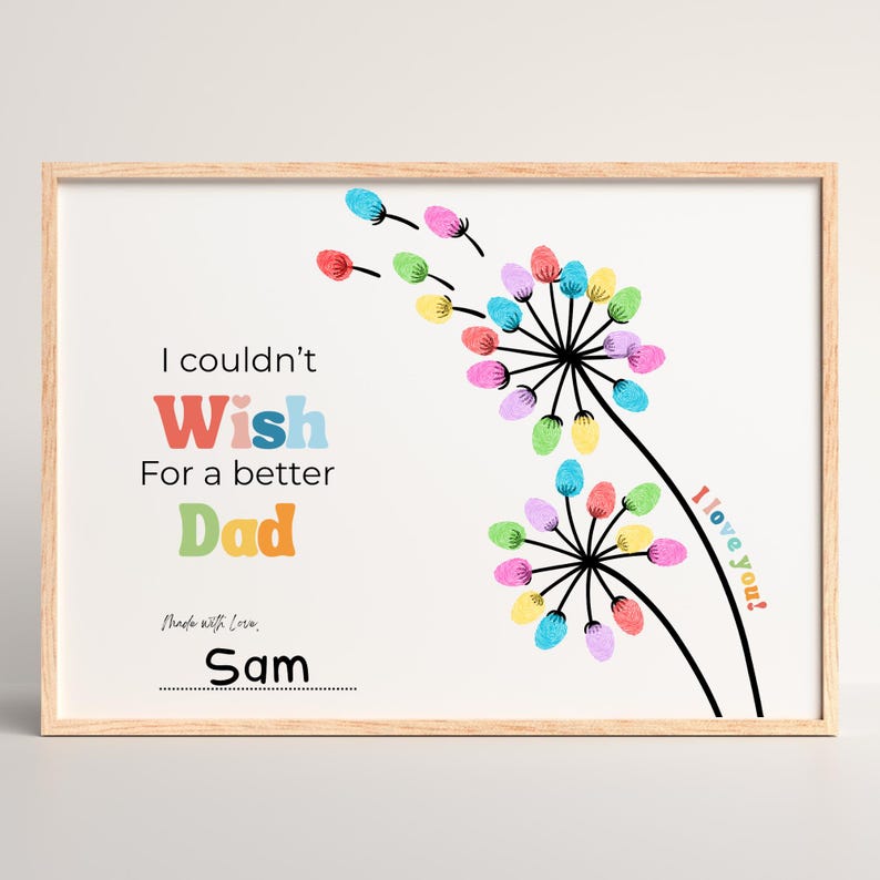May include: A framed print with the text "I couldn't Wish For a better Dad" in colorful letters. The artwork features dandelion-like designs with colorful finger-painted accents and the words "I love you!" and "Made with Love, Sam".