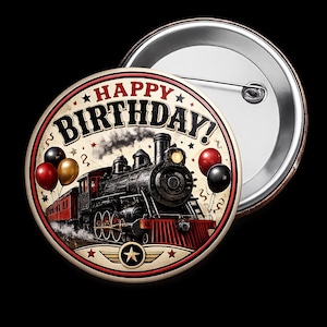 May include: A round pin-back button featuring a vintage steam locomotive illustration with red, black, and gold balloons. The text HAPPY BIRTHDAY is printed in bold black letters at the top. The design includes a star emblem and red border accents.