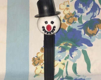 Brand New and Sealed white stick PEZ: Snowman w/brown hat red pack 