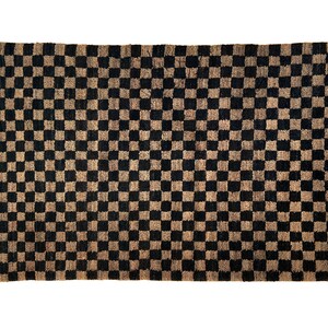 May include: A black and brown checkered rug with a woven texture.