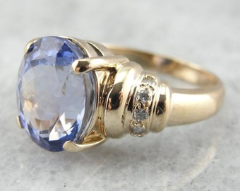 Indigo Purple Tanzanite and Diamond Ring in Yellow Gold