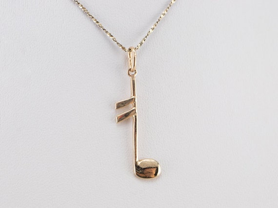 14K Yellow Gold CZ Music Note Pendant - 15.5 Mm