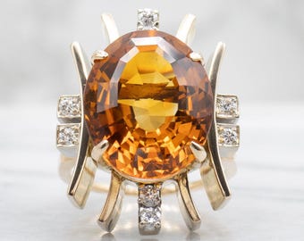 Anello modernista di grande impatto, oro giallo 14 carati, citrino ovale 14,3 x 17,5 mm