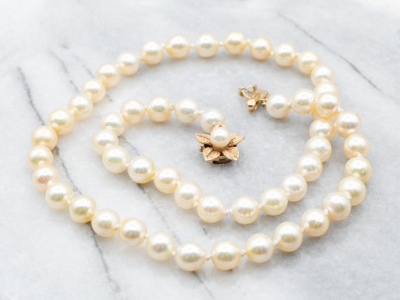 Designer Fresh Water Pearl Necklace with Authentic Louis Vuitton Lock –  Relics to Rhinestones