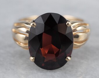 Anillo de granate en oro amarillo de 14 quilates con piedra preciosa ovalada vintage