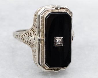 14 kt gouden zwarte onyx diamanten flipring, maat 9,25 inch