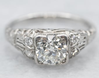 Anillo de compromiso Art Déco de platino con diamantes y detalles de diamantes