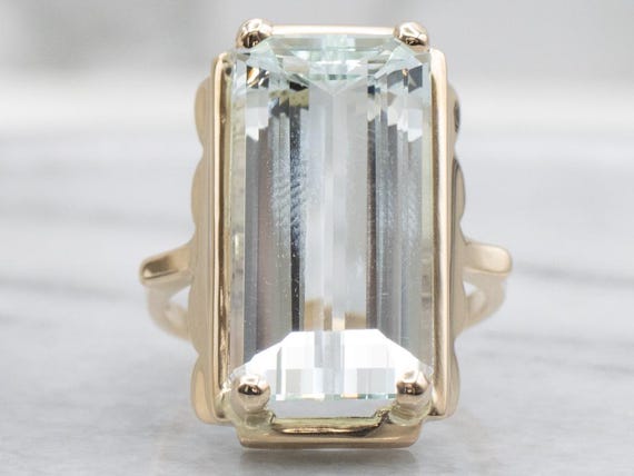 Elongated Emerald-Cut Aquamarine and Gold Cocktail Ring