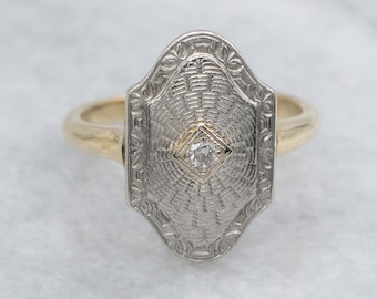 Vintage Diamond Solitaire Ring with Engraved Patterns