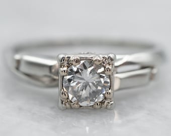 18 kt witgouden diamanten solitairering, illusiekop