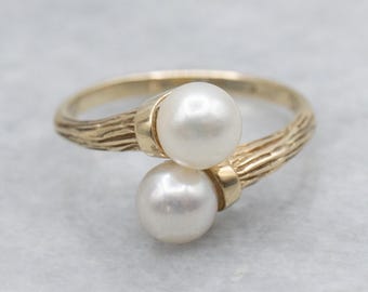 Dubbele bypass-ring zoutwaterparel met getextureerd goud