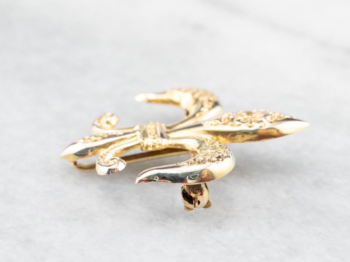 Spilla Fleur de Lis: spilla da bavero in cristallo in stile vintage