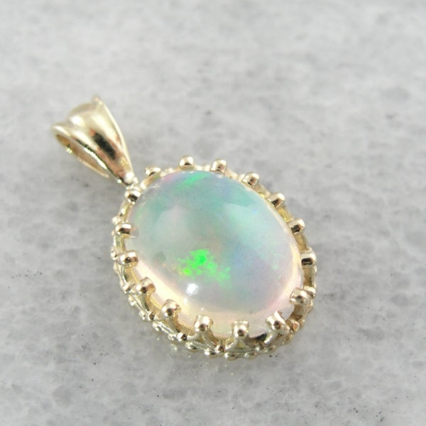 RESERVED | Glittering Ethiopian Oval Opal Pendant Set In Ornate Gold Frame 8E7RTJ-D