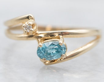 Yellow Gold East West Blue Zircon Bypass Ring with Diamond Accent, Yellow Gold Blue Zircon Ring, Blue Zircon Bypass Ring, Bypass Ring A32745