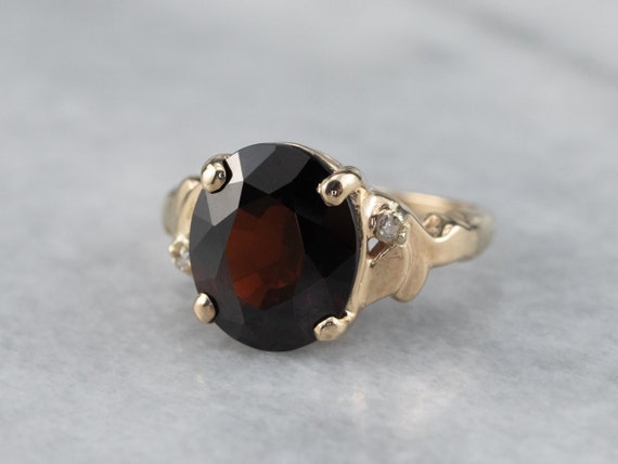 0.49 Carat ctw 10k Gold Oval Red Garnet & Diamond Bypass Swirl Cocktail Anniversary Fasion Ring 0.49 Carat ctw 10k Gold Oval Red Garnet & Diamond Bypass Swirl Cocktail Anniversary Fasion Ring