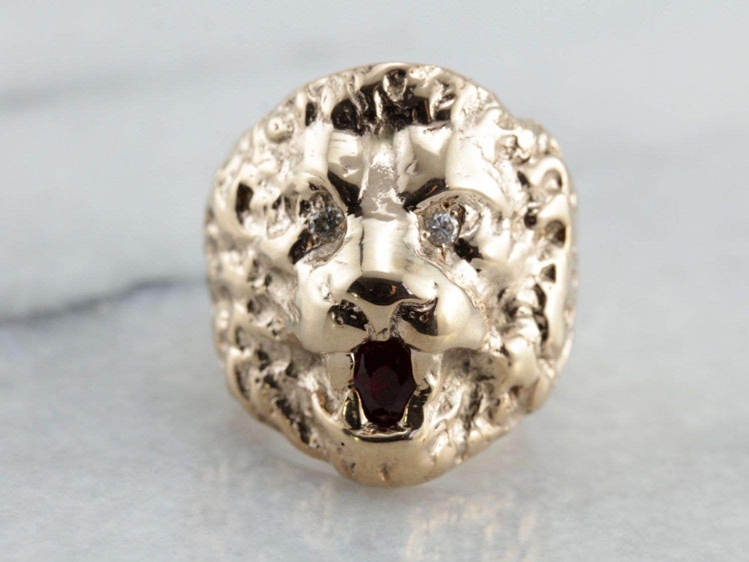 Lion ring with hotsell diamond in mouth