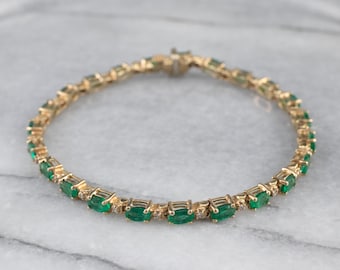 Emerald and Diamond 14K Gold Tennis Bracelet, 6.90 Carats