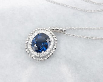 14K ホワイトゴールド ブルーサファイアとダイヤモンド ハロー