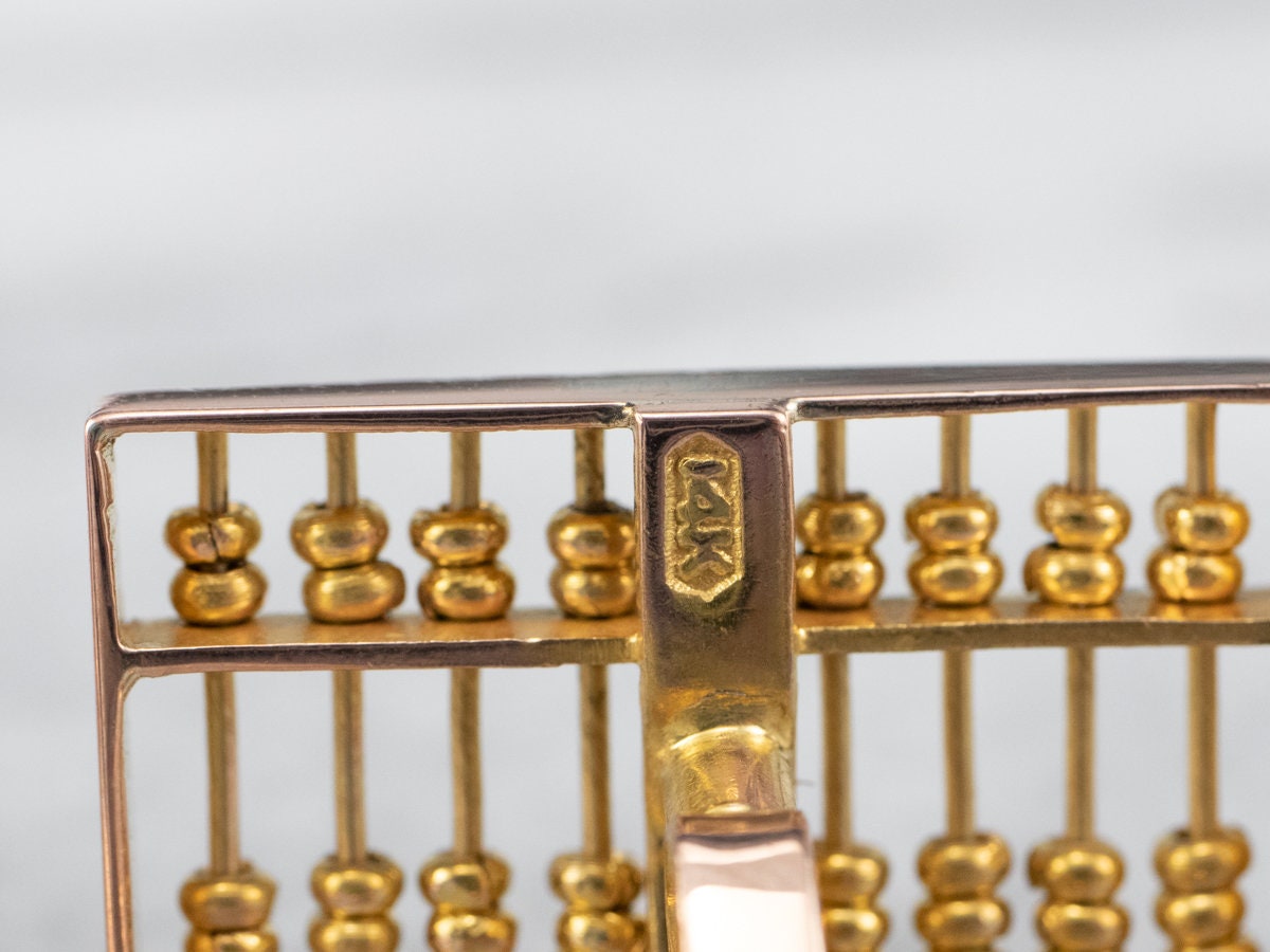 Suan pan deals gold ring