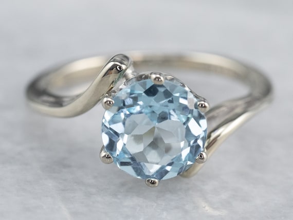 White gold ring with blue topaz sale