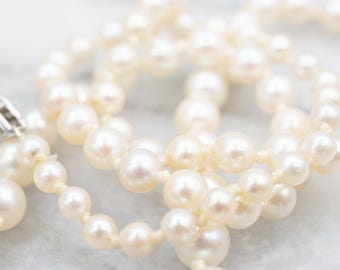 Colar de pérolas de água salgada em degradê, fecho de diamante em ouro branco 14K